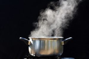 steam on pot in kitchen